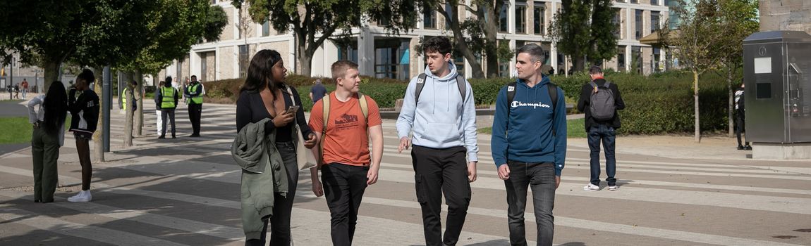 students walking across campus central quad tu dublin grangegorman