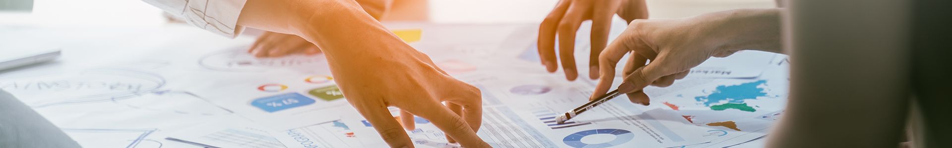 people studying a building document