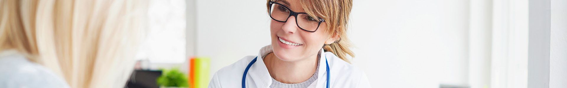 nurse speaking with a women