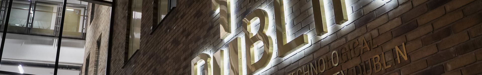 tu dublin brass sign east quad exterior