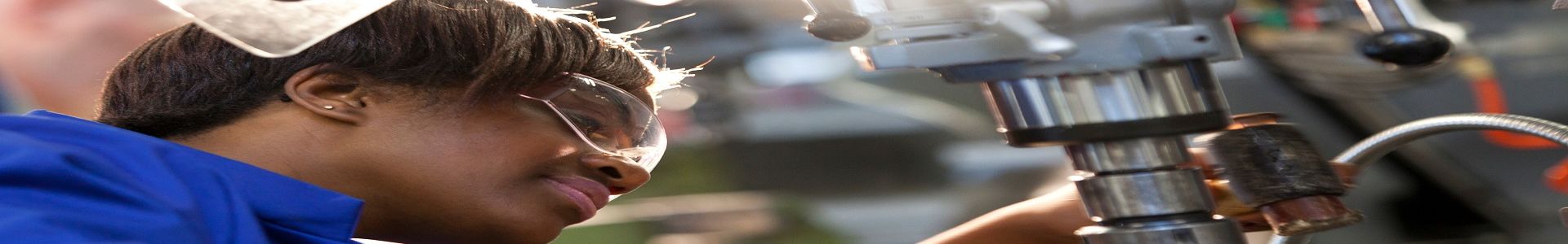 girl doing Metalwork