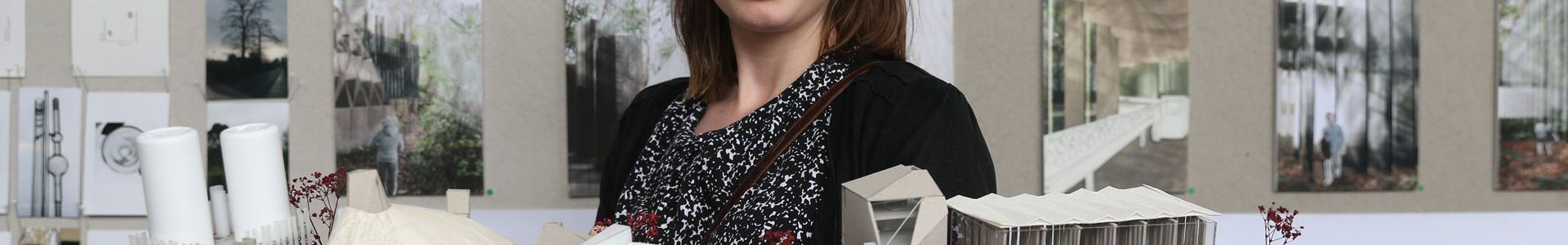 Student with architecture pieces