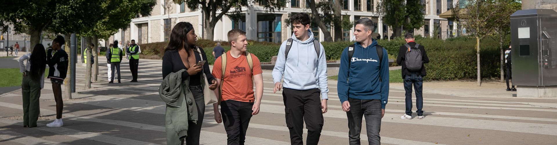 students walking across campus central quad tu dublin grangegorman