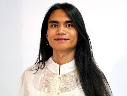 photo of smiling student with long dark hair