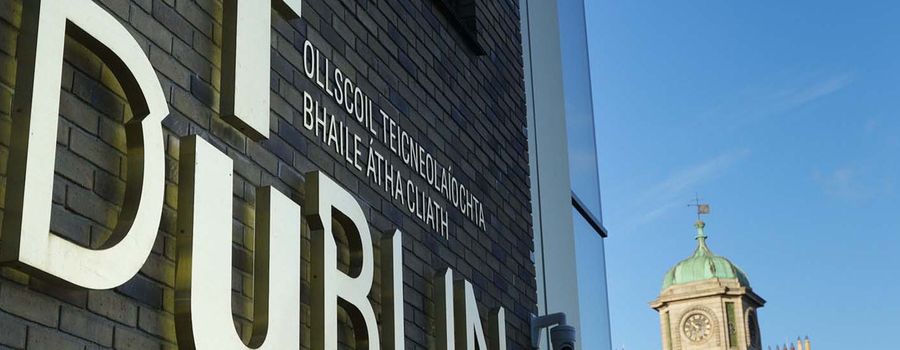 TU Dublin Brass sign east quad building Grangegorman clock tower in background