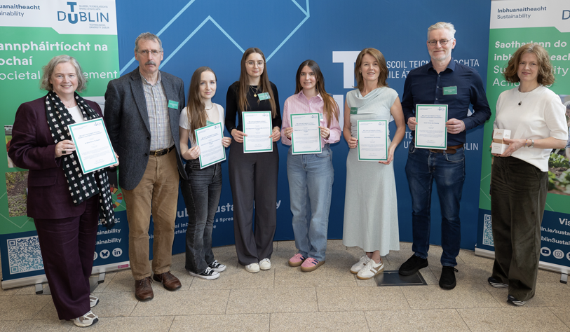 students and academic posted with certificates as part of the SLWC roundtable event