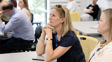 photo of staff member learning in a classroom