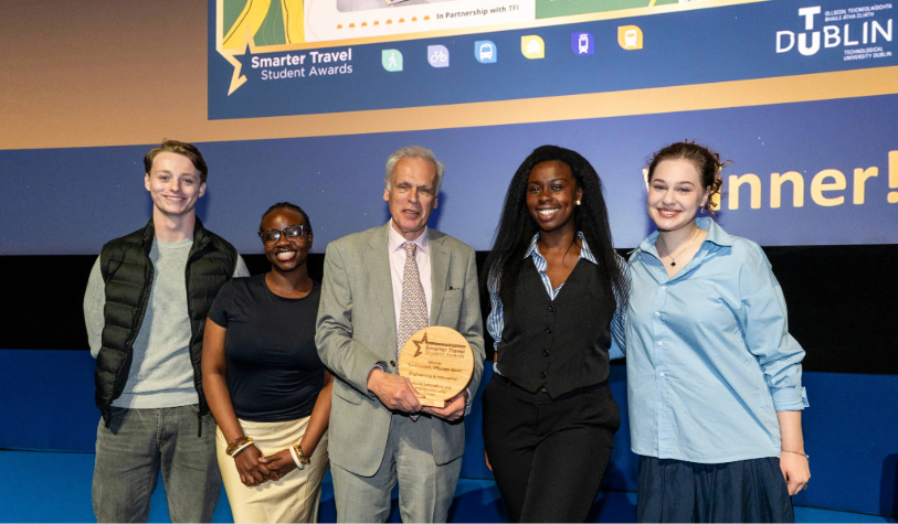 two white men, two black women and one white woman hold award at smarter travel student awards