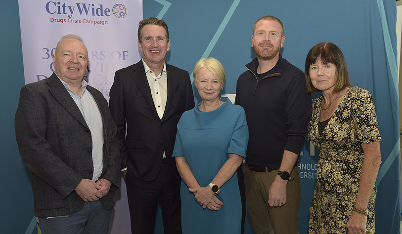an image of the TU Dublin President with 4 other people standing in front of a sign that says CityWide