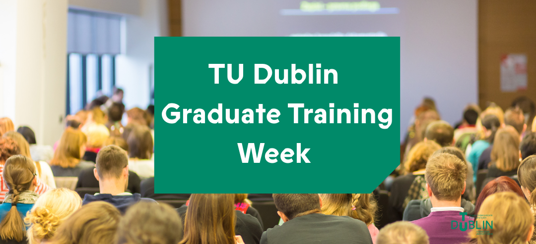 A crowd of people looking a presentation with the title TU Dublin Graduate Training Week overlayed