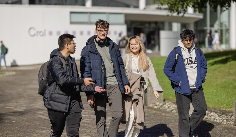 A group of TU Dublin students walk together on the Blanchardstown Campus