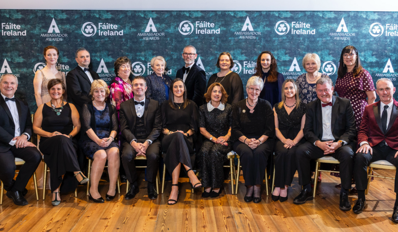 A group of people pose for a photo