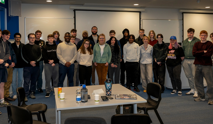 A group of students pose for a photo at an event